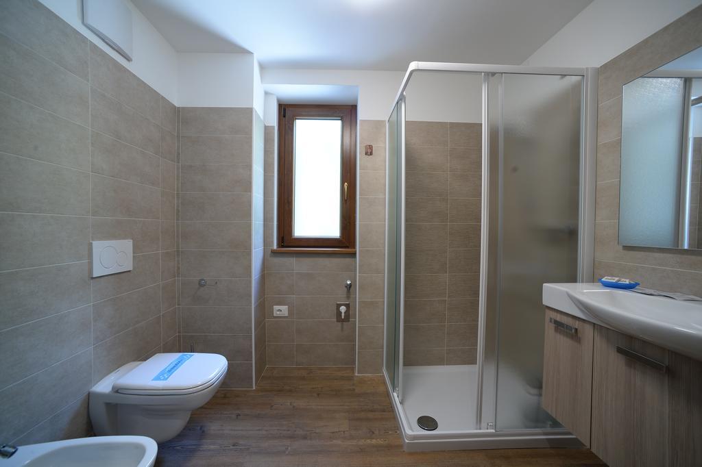 Aparthotel La Casa Al Noce à Mezzana  Chambre photo