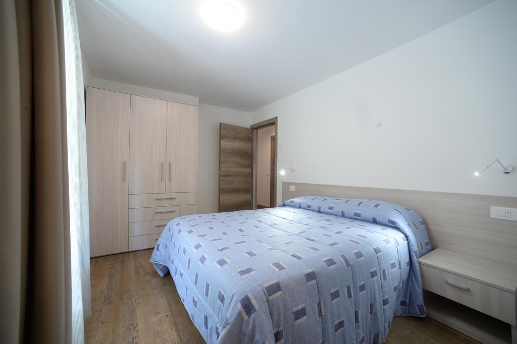 Aparthotel La Casa Al Noce à Mezzana  Chambre photo